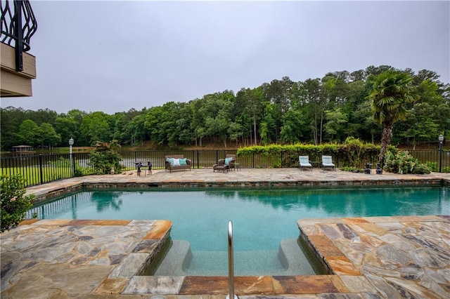 2675 Portabella Ln, Cumming, GA 30041 - view of swimming pool with a patio area