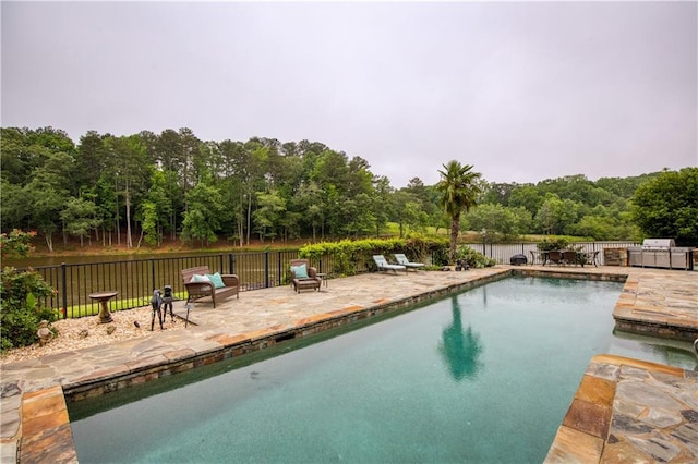 2675 Portabella Ln, Cumming, GA 30041 - view of pool featuring a patio and a wooded view