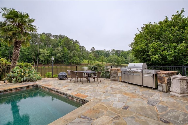 2675 Portabella Ln, Cumming, GA 30041 - view of pool featuring a patio area, outdoor dining area, and view of scattered trees