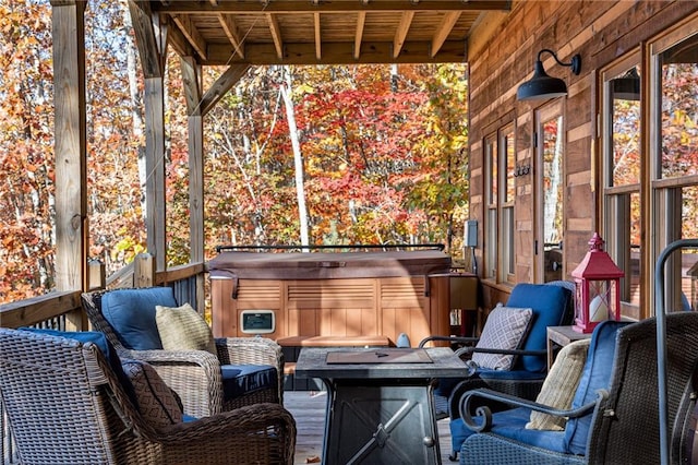 exterior space with a hot tub