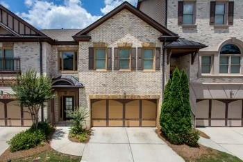 1175 Grassy Oat Ln, Lawrenceville, GA 30045 - view of front of house with driveway and an attached garage