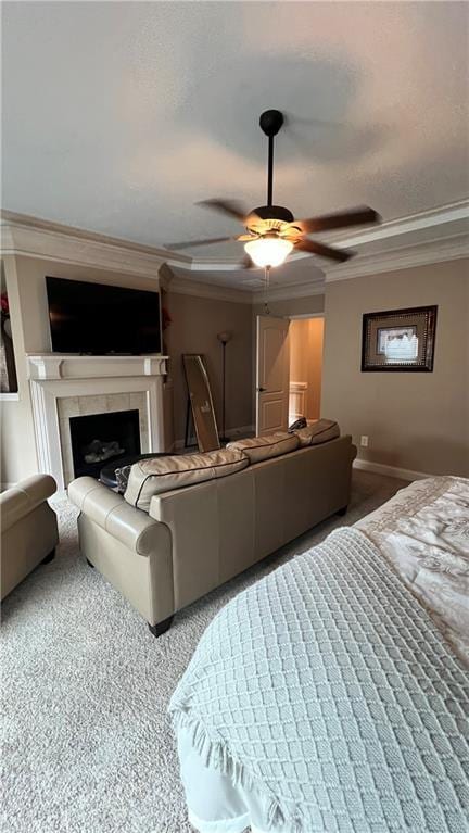 1175 Grassy Oat Ln, Lawrenceville, GA 30045 - bedroom featuring carpet, crown molding, a tile fireplace, and ceiling fan