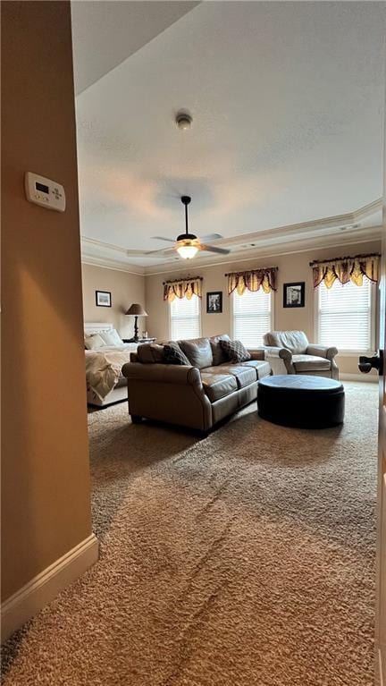 1175 Grassy Oat Ln, Lawrenceville, GA 30045 - carpeted living area featuring crown molding, healthy amount of natural light, and ceiling fan