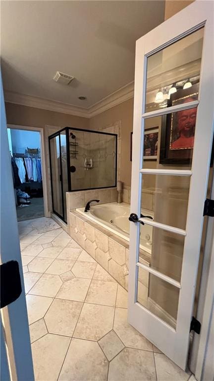 1175 Grassy Oat Ln, Lawrenceville, GA 30045 - full bathroom with a stall shower, ornamental molding, a whirlpool tub, tile patterned flooring, and a walk in closet