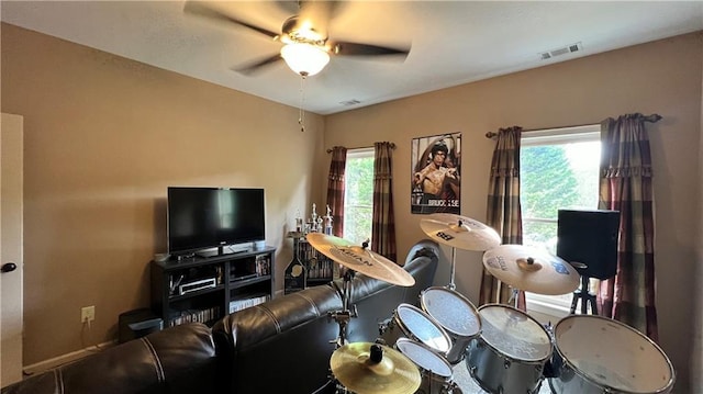 1175 Grassy Oat Ln, Lawrenceville, GA 30045 - living room with a ceiling fan and baseboards