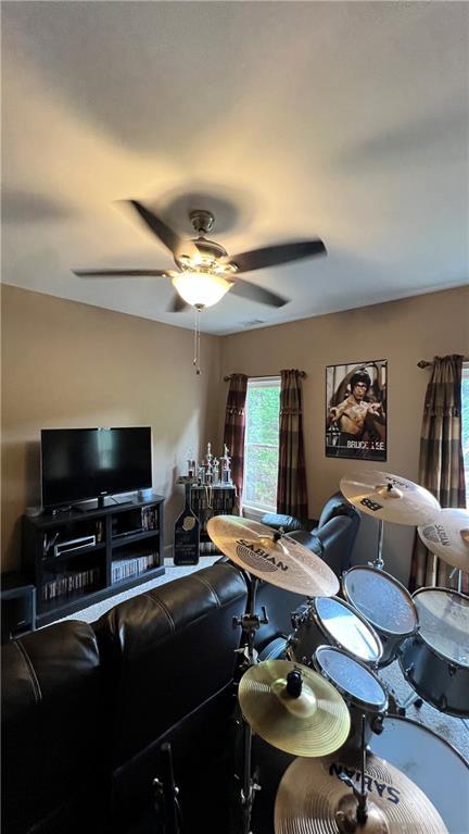 1175 Grassy Oat Ln, Lawrenceville, GA 30045 - living room featuring a ceiling fan