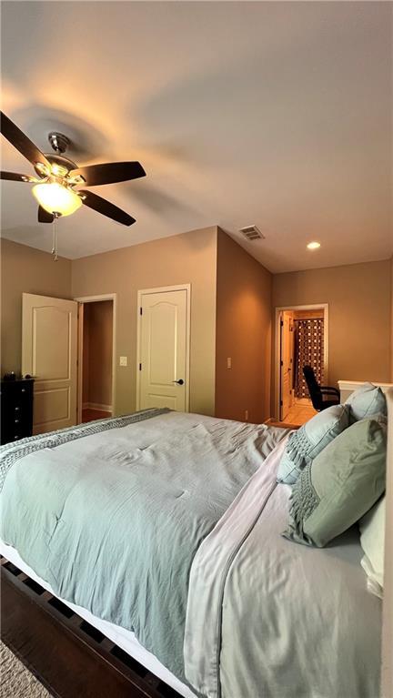 1175 Grassy Oat Ln, Lawrenceville, GA 30045 - bedroom featuring ceiling fan