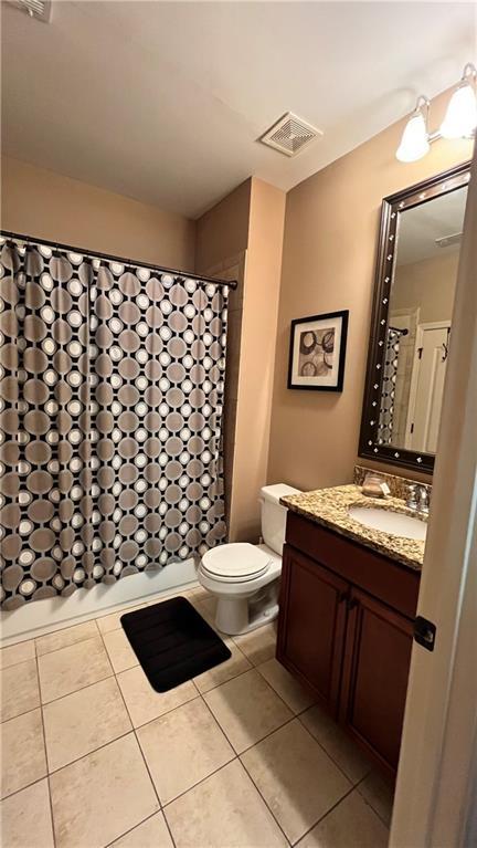 1175 Grassy Oat Ln, Lawrenceville, GA 30045 - full bathroom featuring vanity, tile patterned floors, and curtained shower