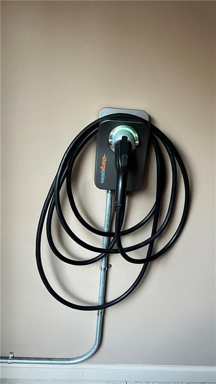 1175 Grassy Oat Ln, Lawrenceville, GA 30045 - detailed view of electric vehicle charger