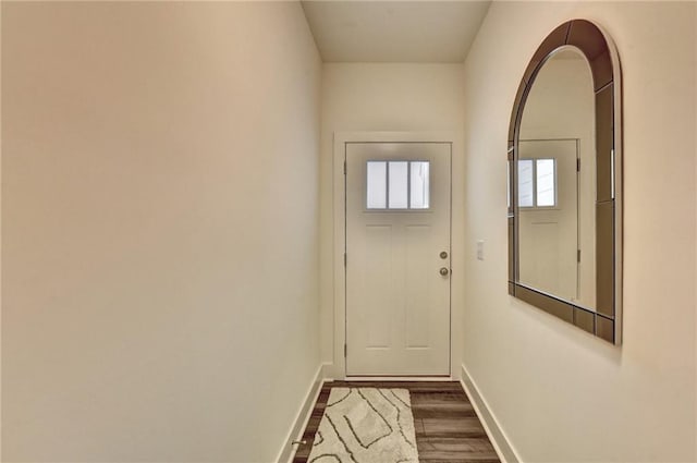 doorway to outside with dark hardwood / wood-style flooring