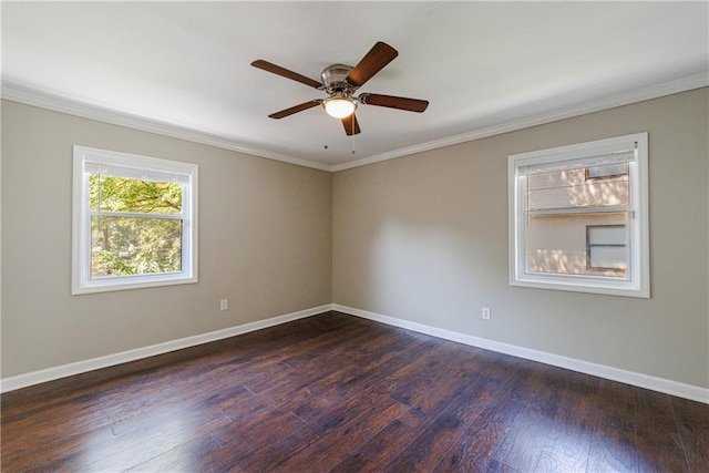 unfurnished room with ceiling fan, dark hardwood / wood-style floors, and crown molding