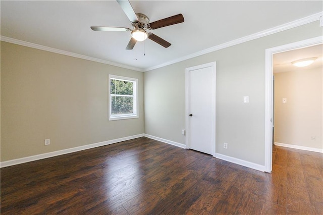 unfurnished room featuring ceiling fan, dark hardwood / wood-style floors, and crown molding