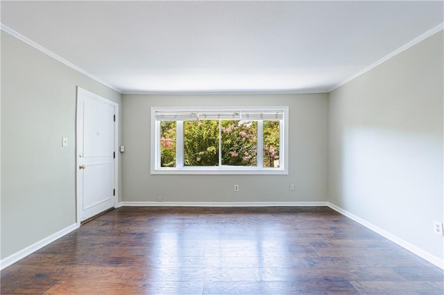 unfurnished room featuring dark hardwood / wood-style flooring and ornamental molding