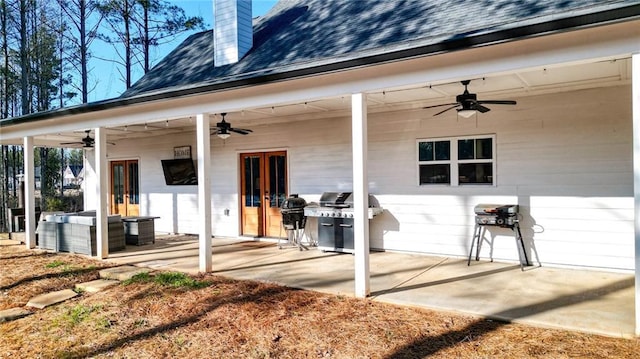 rear view of property featuring a patio and ceiling fan