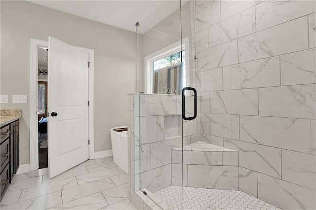 bathroom featuring vanity and a shower with shower door