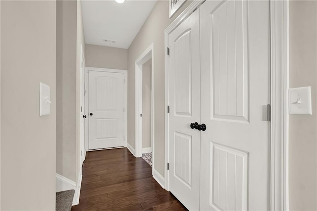 hall featuring dark hardwood / wood-style floors