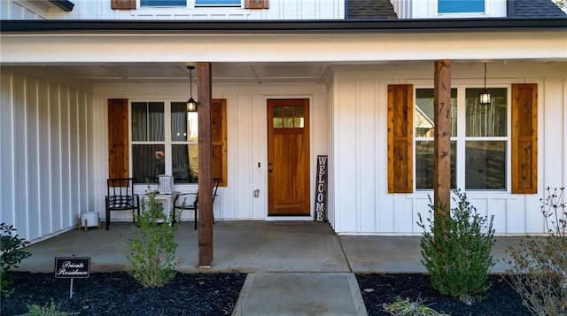 doorway to property with a porch