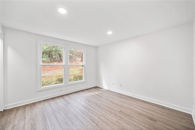1379 Keys Lake Dr NE, Brookhaven, GA 30319 - empty room featuring recessed lighting, wood finished floors, and baseboards