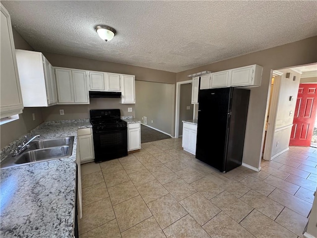 kitchen with black appliances, white cabinets, sink, and a textured ceiling