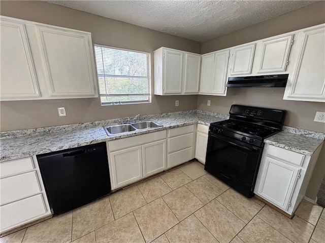 kitchen featuring black appliances, white cabinetry, sink, and a textured ceiling