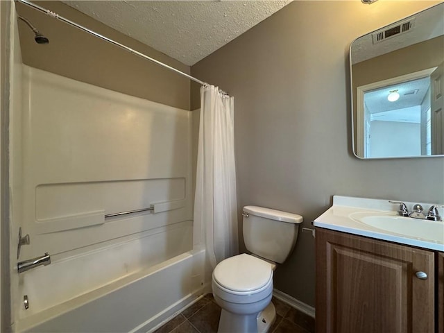 full bathroom with vanity, a textured ceiling, shower / bathtub combination with curtain, tile patterned flooring, and toilet