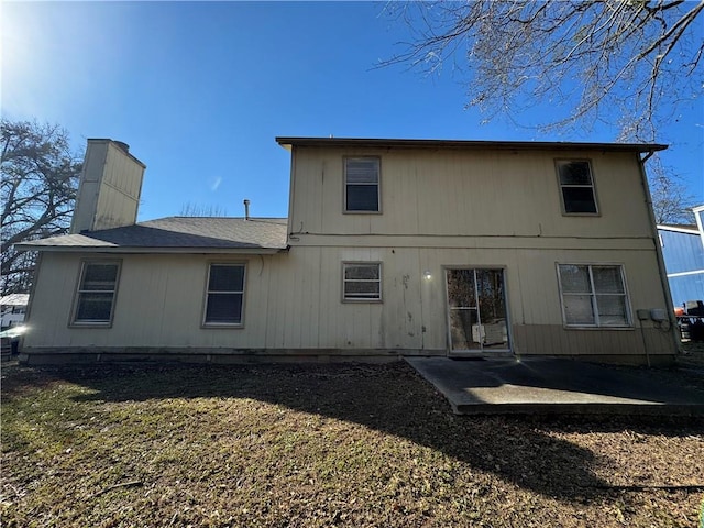 rear view of property with a patio area