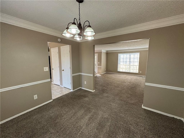 unfurnished dining area with light carpet, ornamental molding, a textured ceiling, and an inviting chandelier