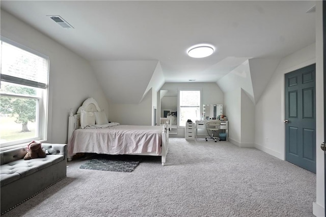 455 Saddle Bow Dr, Lawrenceville, GA 30046 - carpeted bedroom with vaulted ceiling and an office area