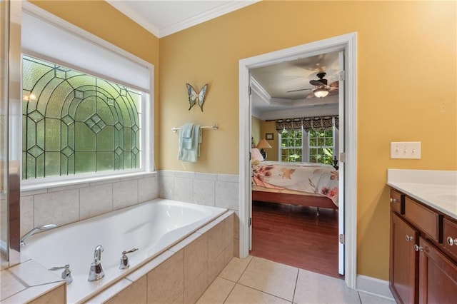 4535 Vanadium Bnd, Cumming, GA 30040 - ensuite bathroom with ornamental molding, vanity, a garden tub, tile patterned flooring, and ceiling fan