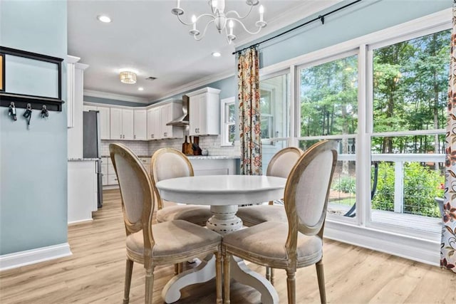 25 Highlands Way, Oxford, GA 30054 - dining space with ornamental molding, baseboards, a chandelier, light wood-style floors, and recessed lighting