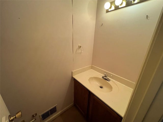 bathroom with visible vents and vanity