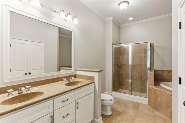 full bathroom featuring a shower stall, tile patterned floors, double vanity, ornamental molding, and toilet