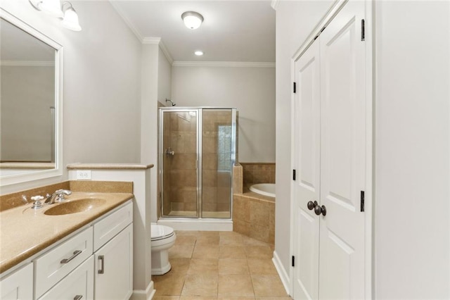 full bathroom featuring ornamental molding, a stall shower, tile patterned floors, vanity, and toilet