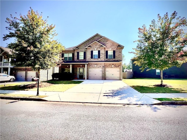 view of front facade featuring a front yard and a garage