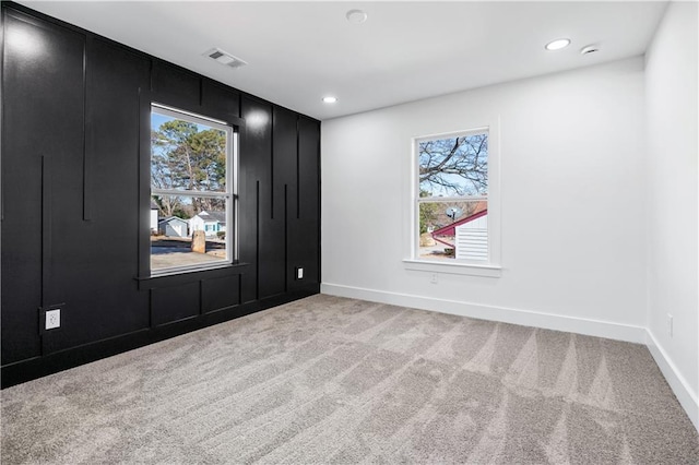 view of carpeted spare room