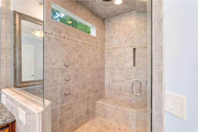 full bath featuring a shower stall and vanity