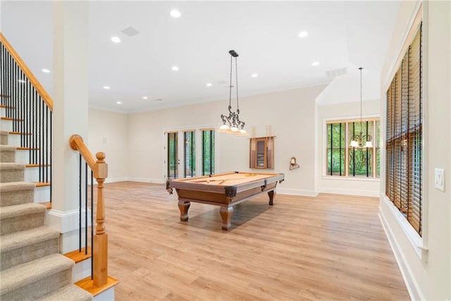 game room with recessed lighting, visible vents, light wood-style floors, ornamental molding, and baseboards