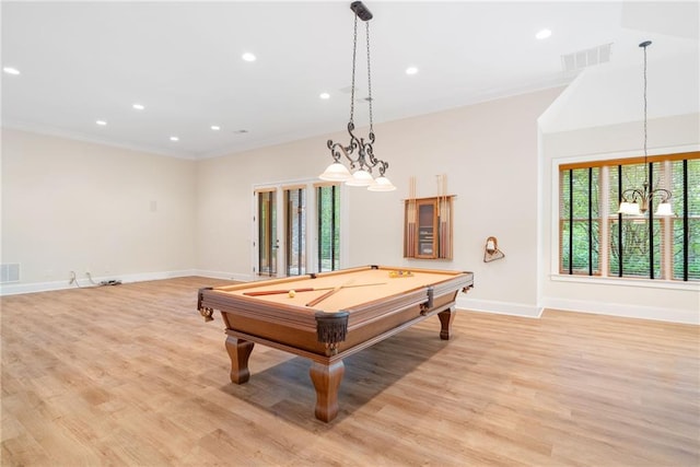 recreation room featuring light wood finished floors, visible vents, pool table, and ornamental molding