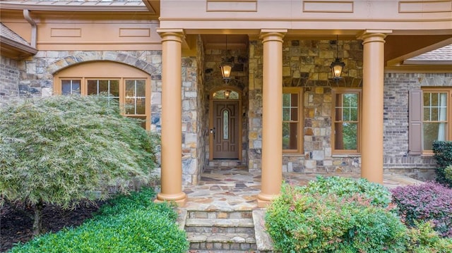 entrance to property with stone siding