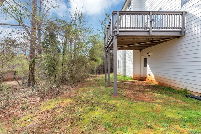 view of yard featuring a deck