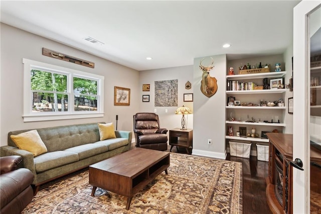 living room with dark wood-type flooring