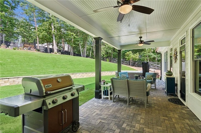 view of patio featuring grilling area and ceiling fan