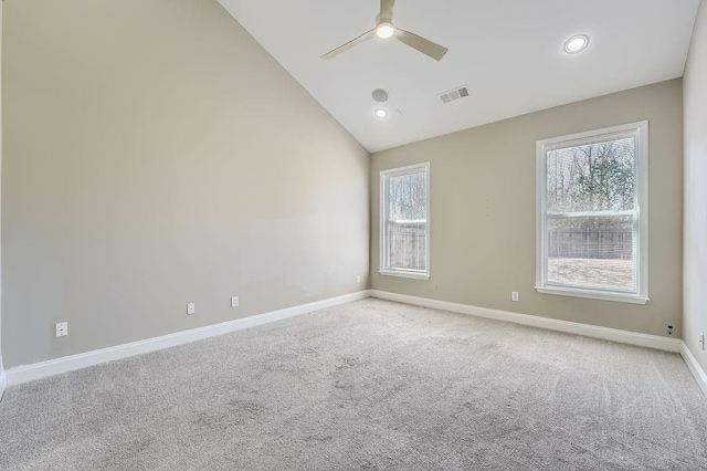 spare room featuring recessed lighting, light colored carpet, visible vents, a ceiling fan, and baseboards