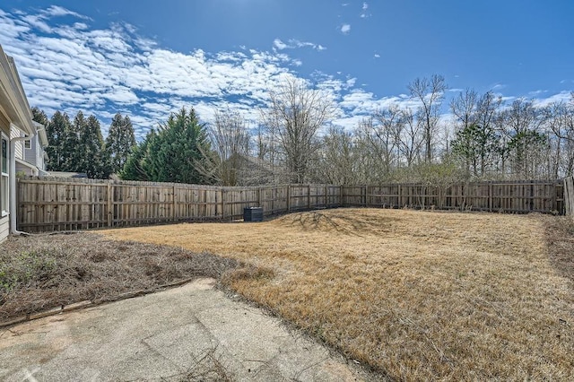 view of yard with a fenced backyard