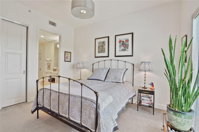 1820 Peachtree St NW Unit 1008, Atlanta, GA 30309 - carpeted bedroom featuring baseboards