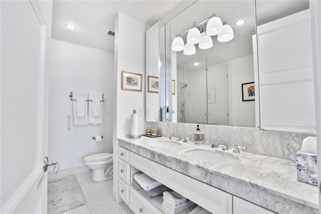 1820 Peachtree St NW Unit 1008, Atlanta, GA 30309 - full bath featuring a stall shower, double vanity, toilet, tile patterned floors, and recessed lighting