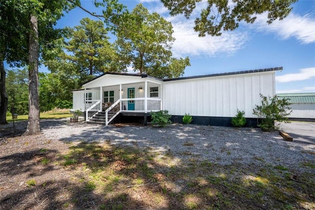 437 Crabapple Rd, Dahlonega, GA 30533 - view of front facade with a porch and board and batten siding