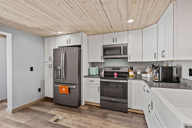 437 Crabapple Rd, Dahlonega, GA 30533 - kitchen featuring appliances with stainless steel finishes, wood ceiling, white cabinets, recessed lighting, and light wood-style floors