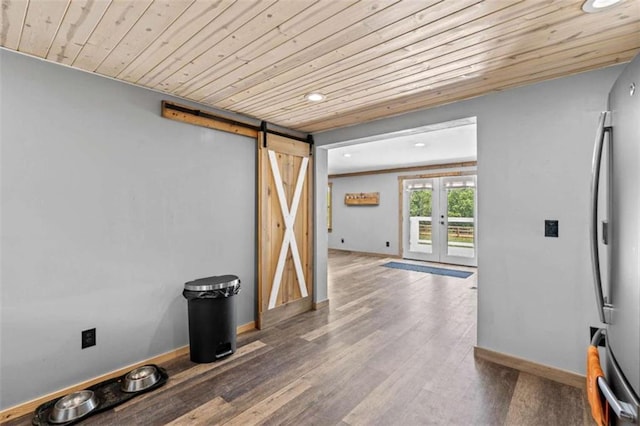 437 Crabapple Rd, Dahlonega, GA 30533 - below grade area featuring a barn door, wooden ceiling, freestanding refrigerator, wood finished floors, and recessed lighting