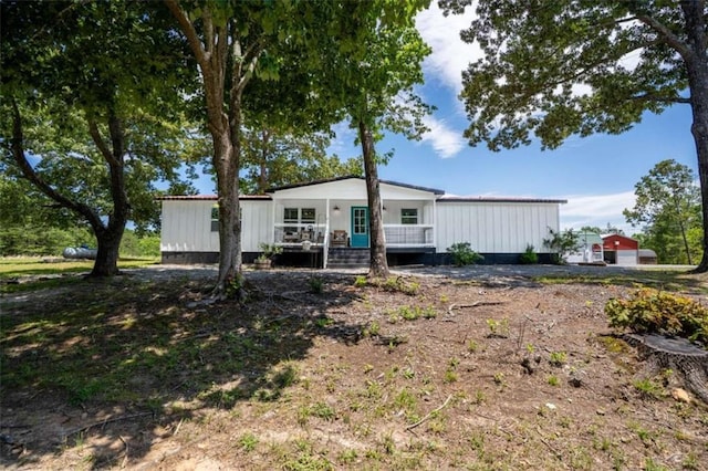 437 Crabapple Rd, Dahlonega, GA 30533 - manufactured / mobile home with board and batten siding and a wooden deck